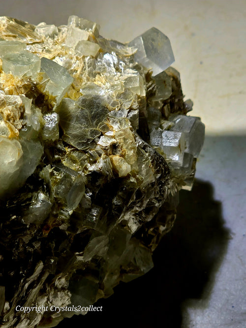 Fluorite crystals with cubic formations and golden matrix, mineral specimen for collectors