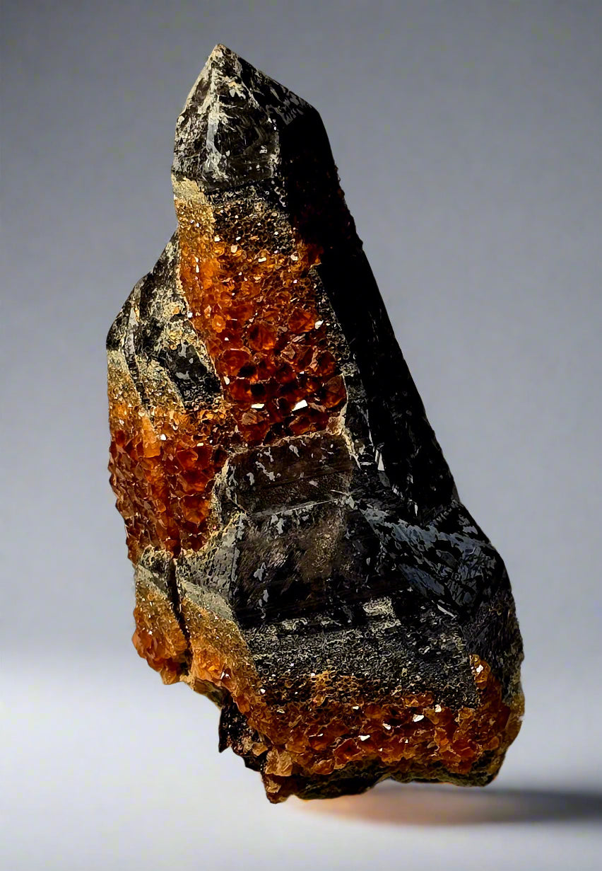 SPESSARTINE  on  SMOKEY QUARTZ, SERPENTINE GARNETS (small cabinet)