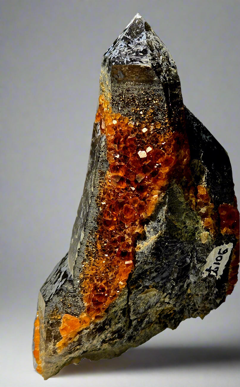 SPESSARTINE  on  SMOKEY QUARTZ, SERPENTINE GARNETS (small cabinet)