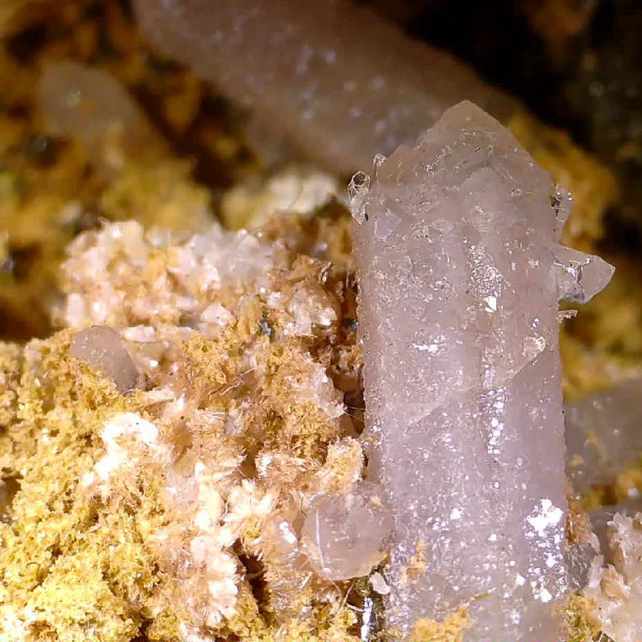Quartz crystal from Brazil, clear prismatic specimen on yellow matrix, mineral collector specimen
