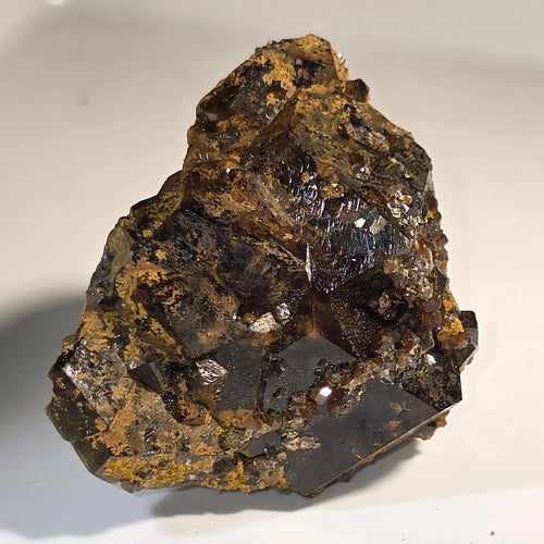 Fluorite crystal specimen with cubic formations and golden matrix, ideal for mineral collectors