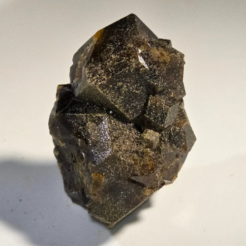 Fluorite crystal specimen with cubic formation and golden inclusions, mineral collector's item