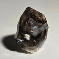 Smoky Quartz crystal with white mineral inclusions, natural geological specimen