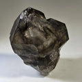 Smoky Quartz crystal specimen with natural facets and internal inclusions, ideal for mineral collectors