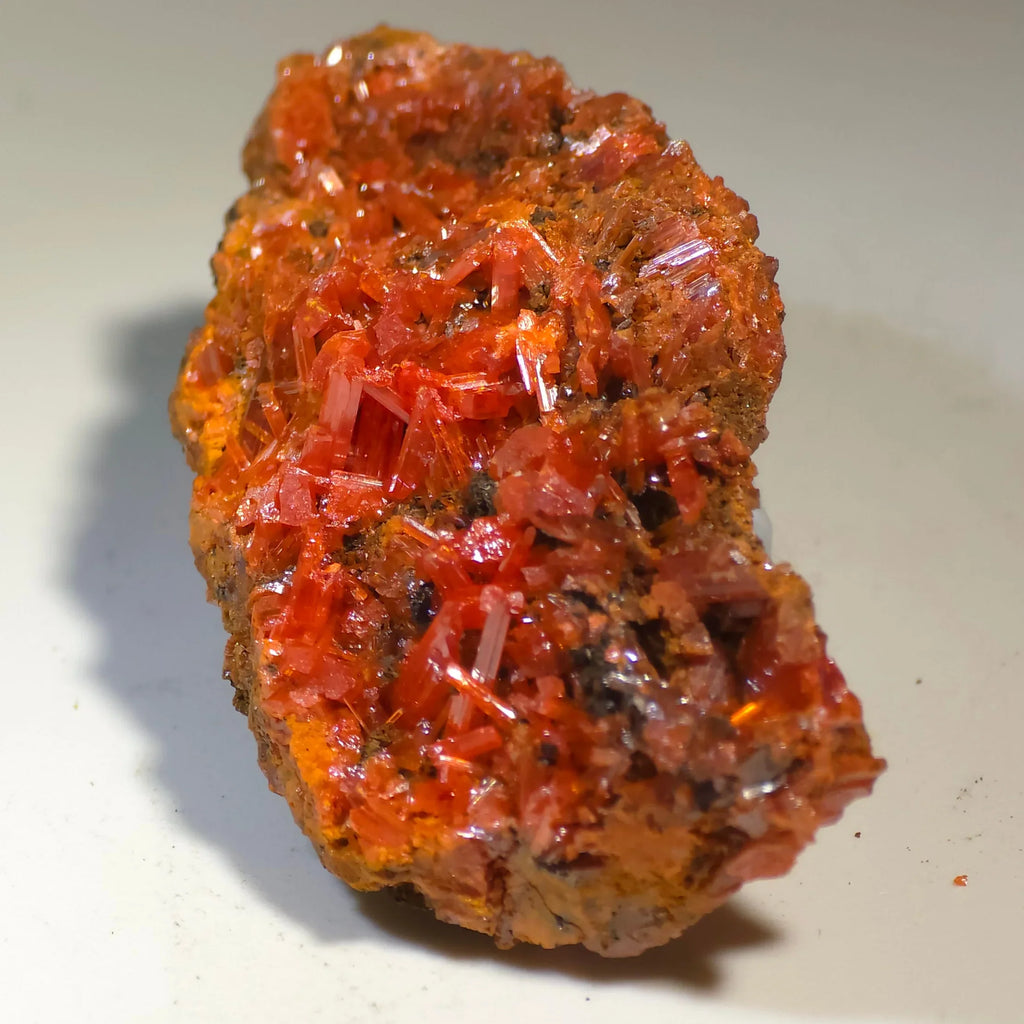 Crocoidite mineral specimen with vibrant red-orange crystals on matrix, classic locality specimen for collectors