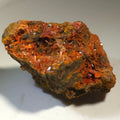 Crocoidite mineral specimen with vibrant red crystals on matrix, ideal for collectors
