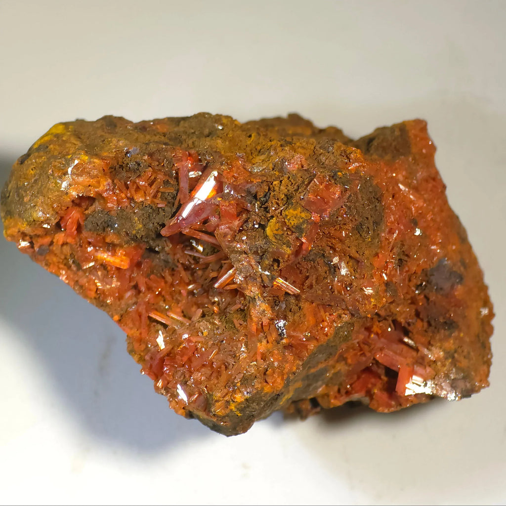Crocoidite mineral specimen with vibrant red-orange crystals on matrix, rare collector's piece