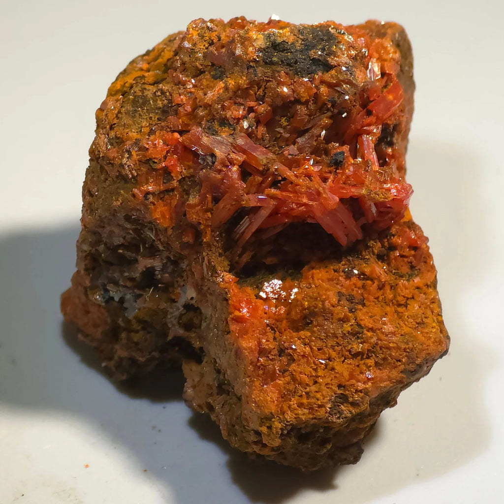 Crocoidite mineral specimen with vibrant red crystals on matrix, classic locality specimen for collectors