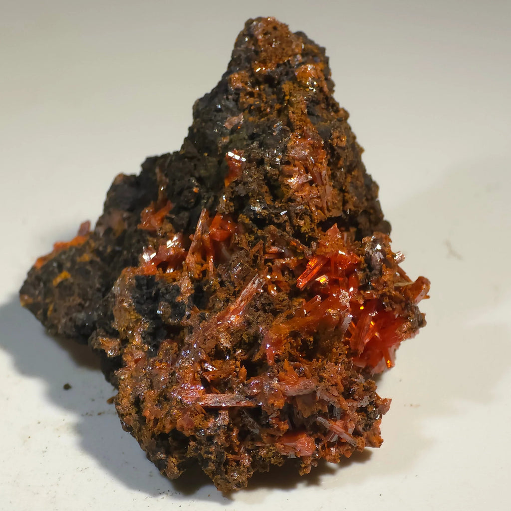 Crocoidite mineral specimen with vibrant red crystals on dark matrix, classic locality specimen for collectors