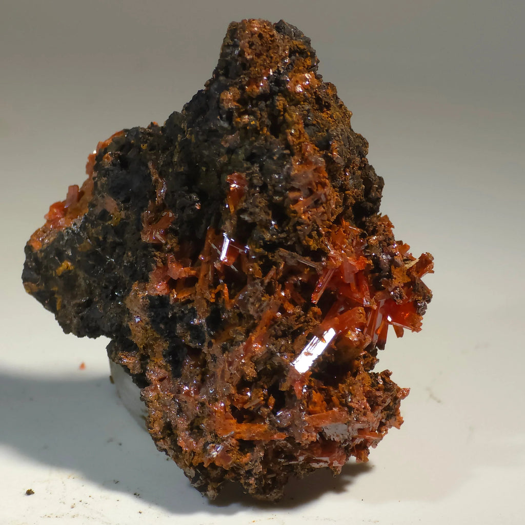 Crocoid on matrix from Russia, vibrant red crystals on dark base, mineral specimen for collectors