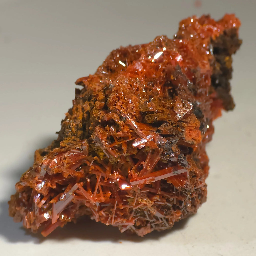 Crocoidite mineral specimen with vibrant red-orange crystals, classic locality specimen for collectors