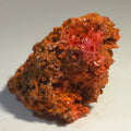 Crocoidite mineral specimen with vibrant red crystals on matrix, rare collector's piece