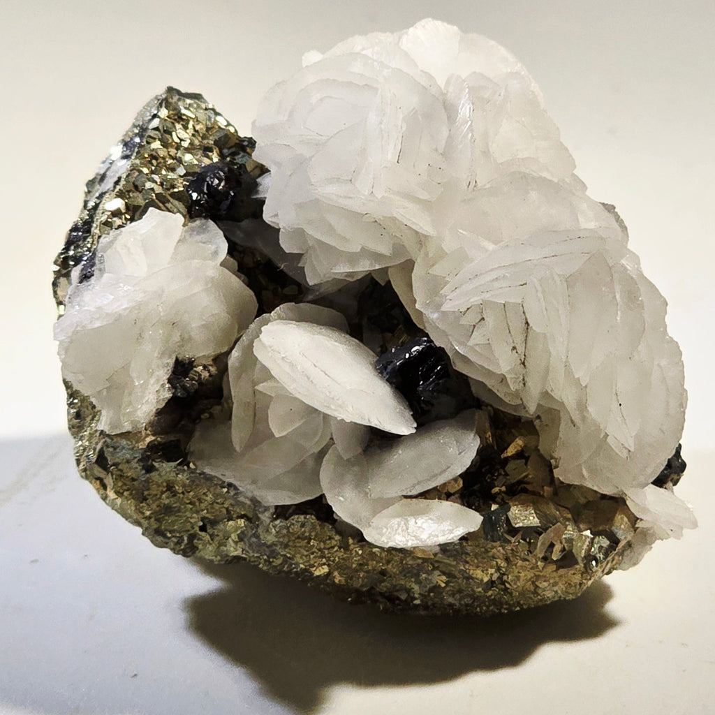 CALCITE on PYRITE, Renison Bell Mine TASMANIA