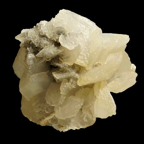 Calcite crystal cluster from Elmwood Mine, Tennessee, showcasing translucent, layered formations against black background