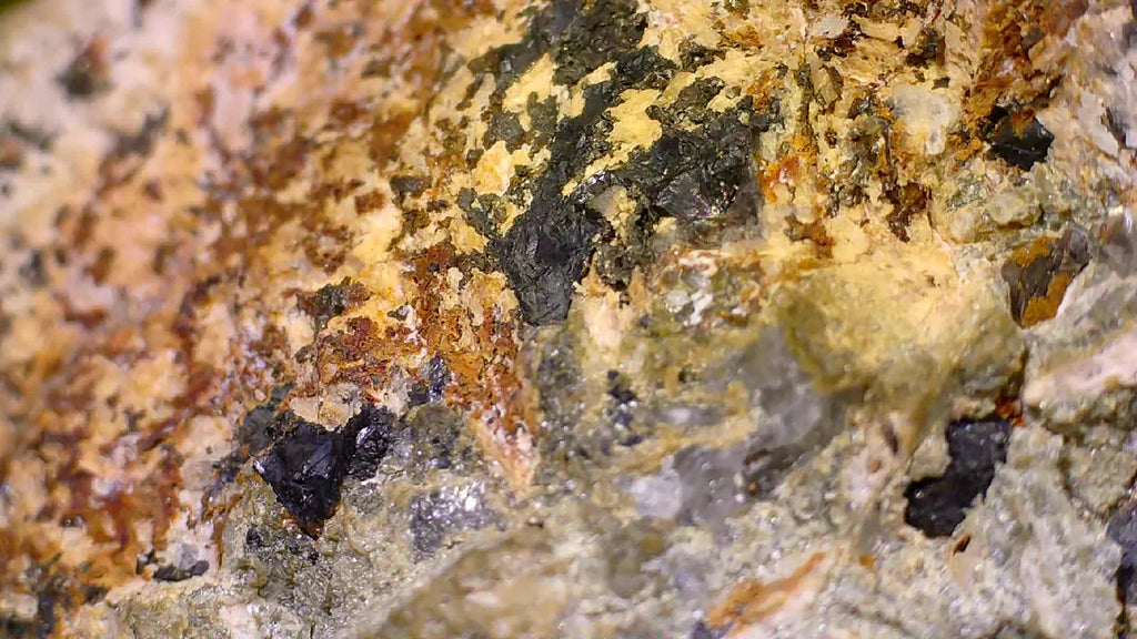 Magnetite crystals in matrix, showcasing metallic luster and earthy tones for mineral collectors