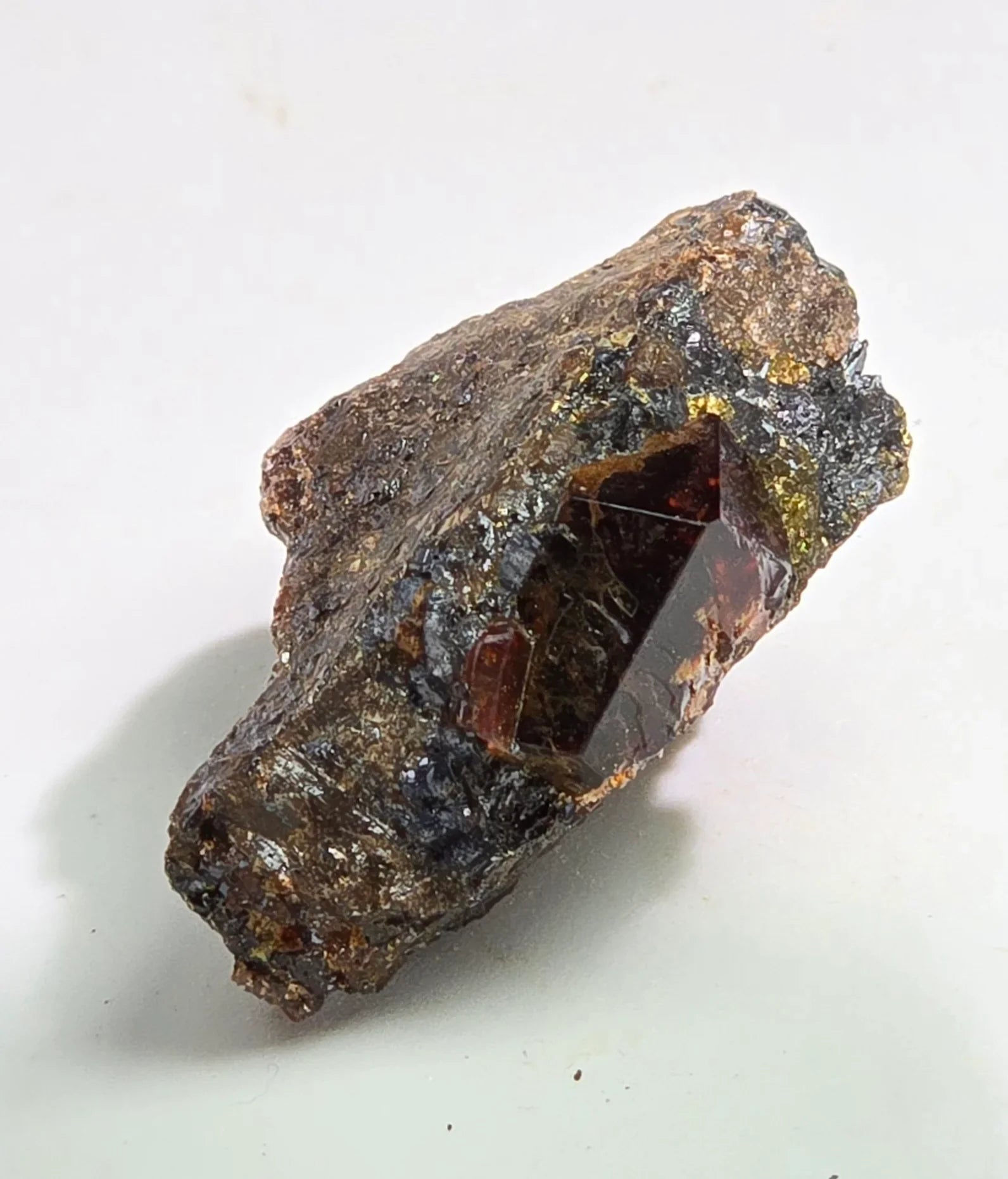 Andradite Garnet crystal on matrix from Russia, deep red gemstone with metallic inclusions