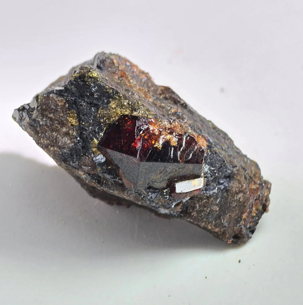 Spessartine Garnet crystal on matrix, deep red gemmy mineral specimen with metallic inclusions