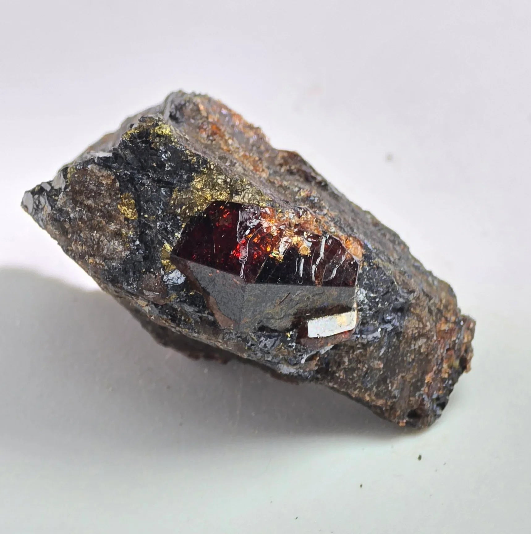 Spessartine Garnet crystal on matrix, deep red gemmy mineral specimen with metallic inclusions