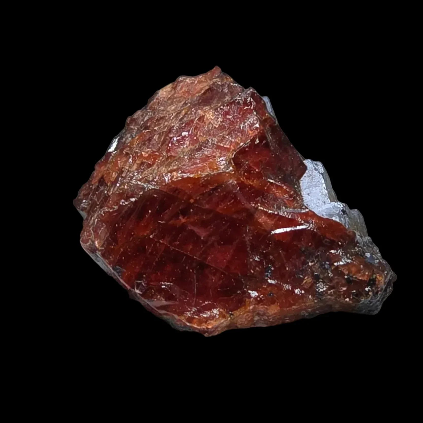 Red Spessartine Garnet crystal specimen with metallic matrix, showcasing deep red color and natural facets