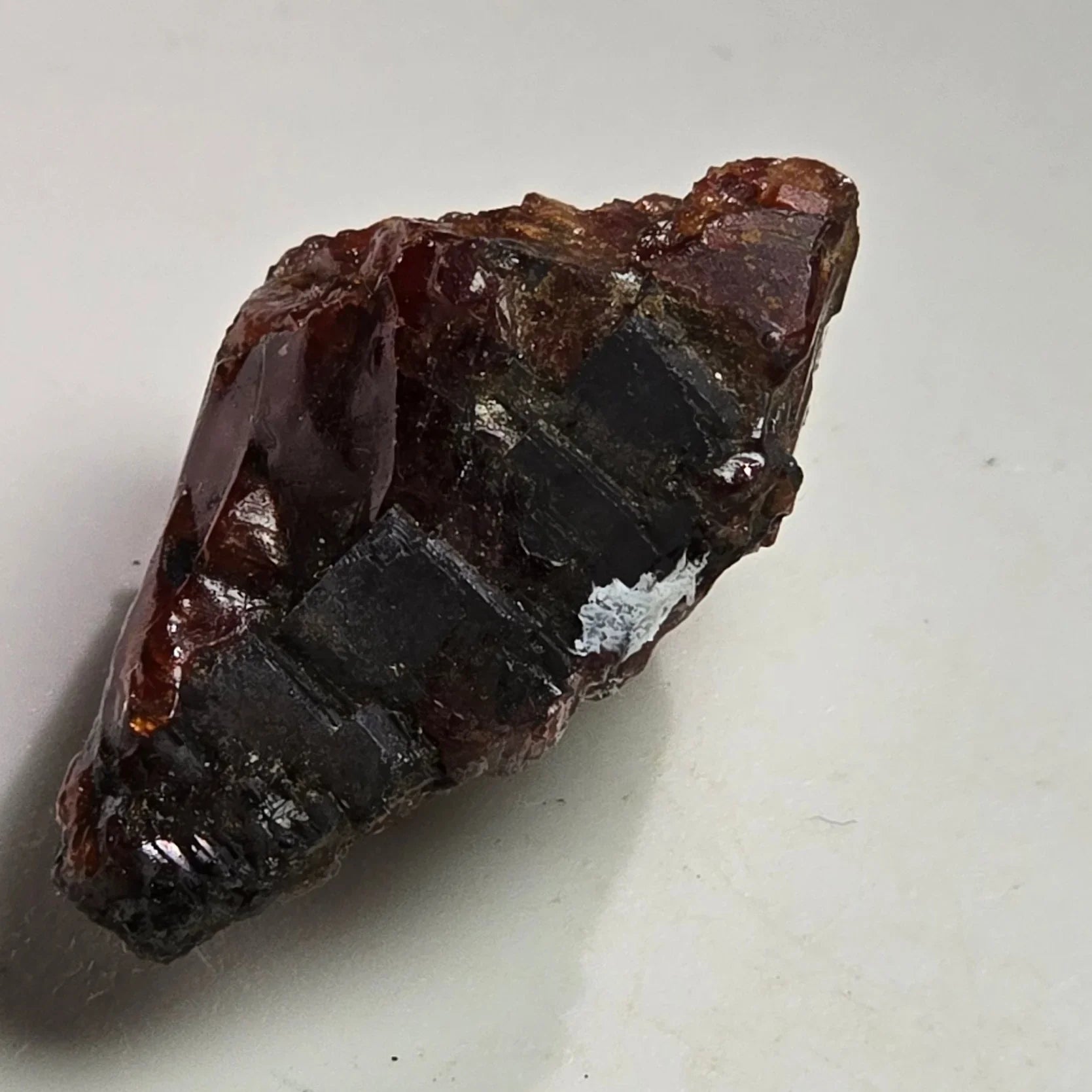 Red Garnet crystal with black inclusions, rough mineral specimen for collectors