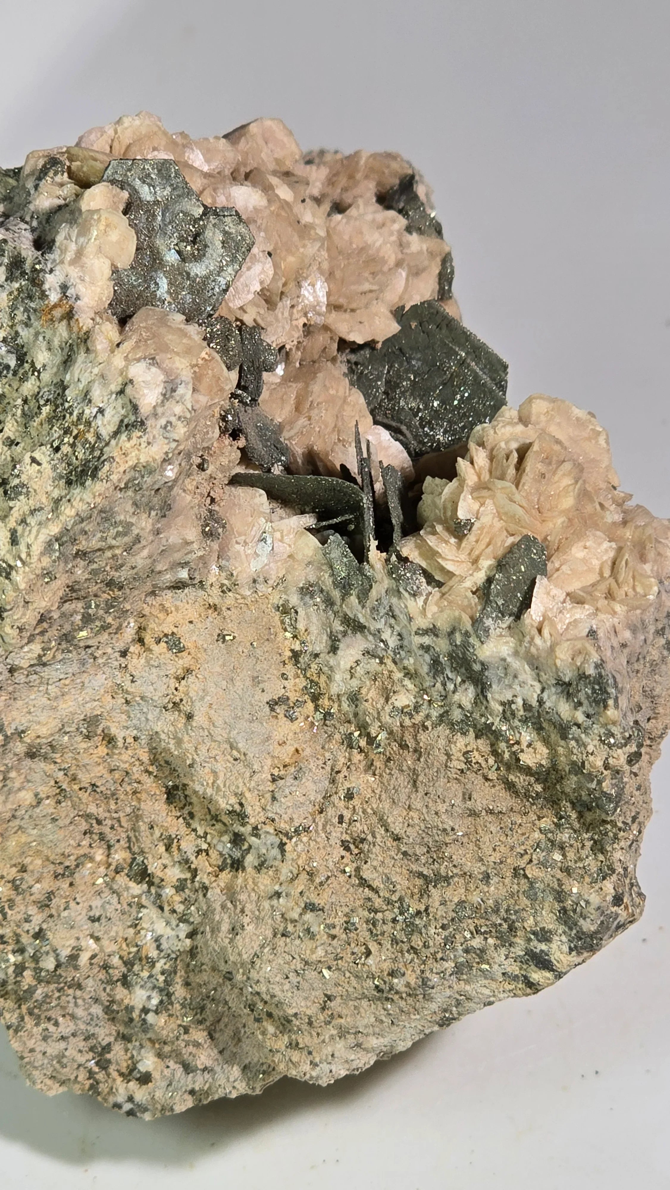Magnetite crystals on pink mica matrix, mineral specimen for collectors