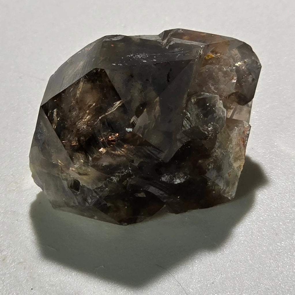 Smoky Quartz Crystal Specimen from Brazil, natural mineral with deep brown tones and geometric facets
