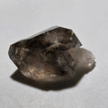 Smoky Quartz Crystal Specimen with Distinctive Striations and Natural Matrix