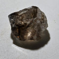 Smoky Quartz crystal specimen with natural facets and earthy tones, ideal for mineral collectors