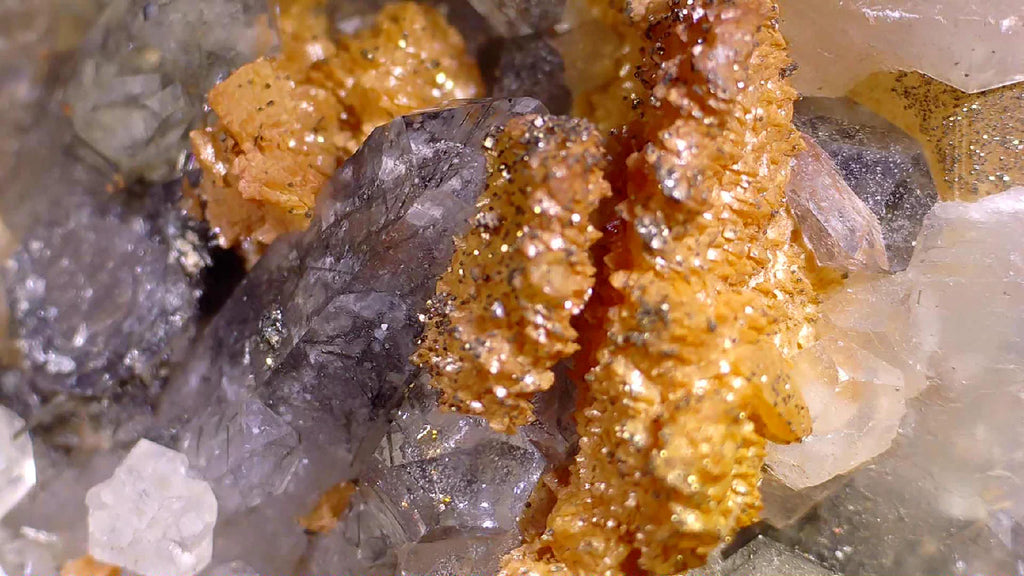 Wulfenite on Barite from Mexico, vibrant orange crystals with metallic luster on clear matrix