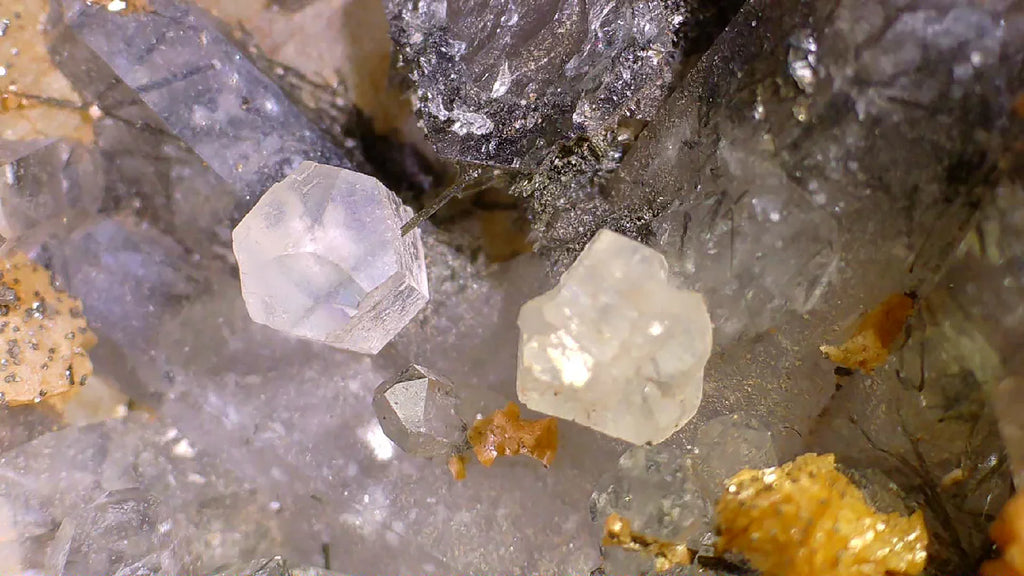 Fluorite crystals with quartz and pyrite, showcasing natural mineral specimen from classic locality