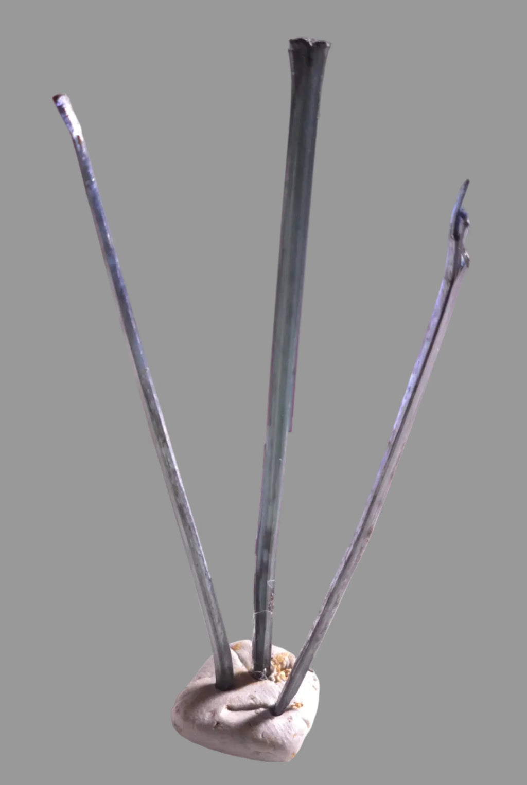 Stibnite mineral specimen with metallic luster, three elongated crystals on matrix, classic locality example