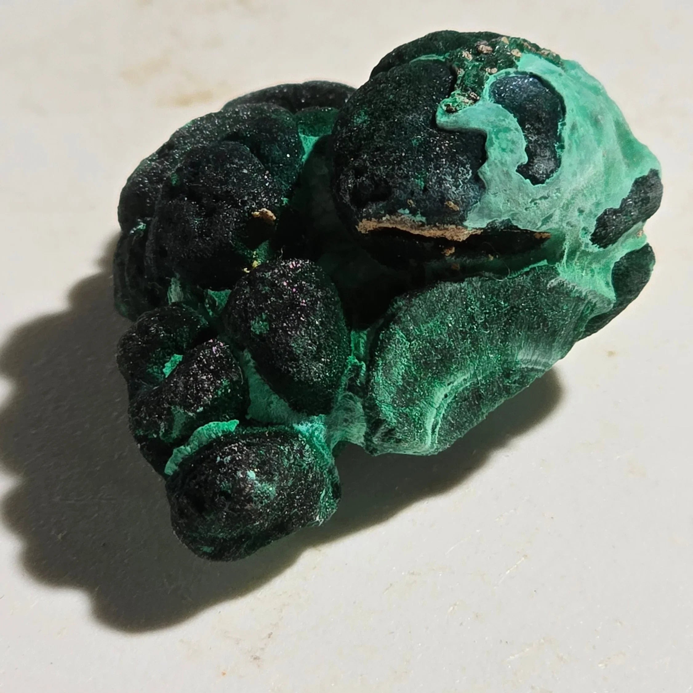 Malachite mineral specimen with vibrant green botryoidal formations, natural crystal texture for collectors