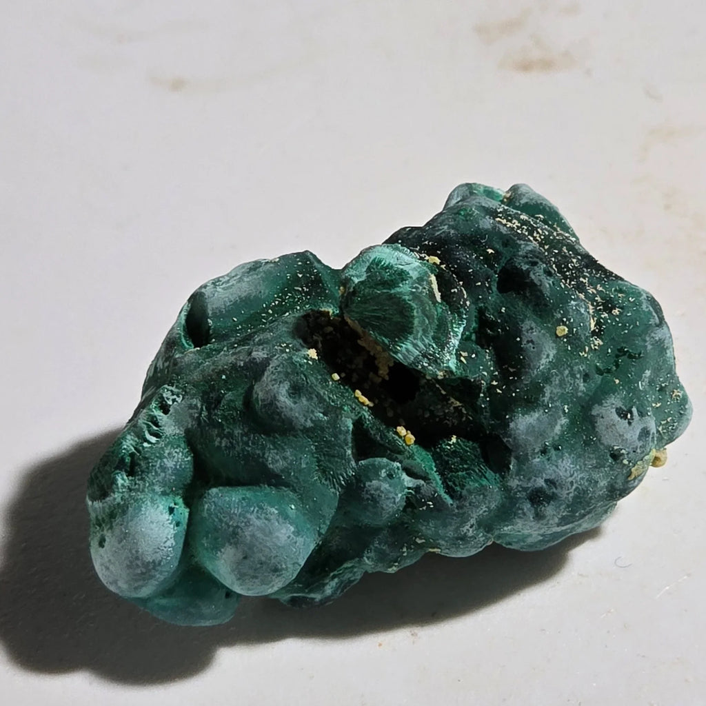 Malachite mineral specimen with botryoidal texture, green copper ore crystal formation