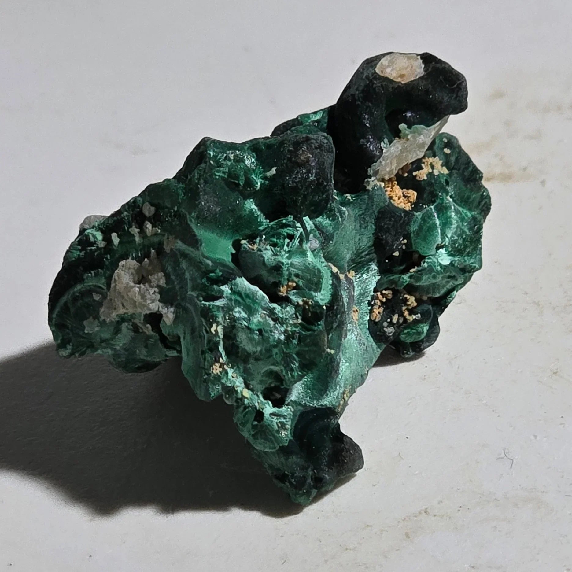 Malachite mineral specimen with vibrant green botryoidal formations and matrix, ideal for collectors