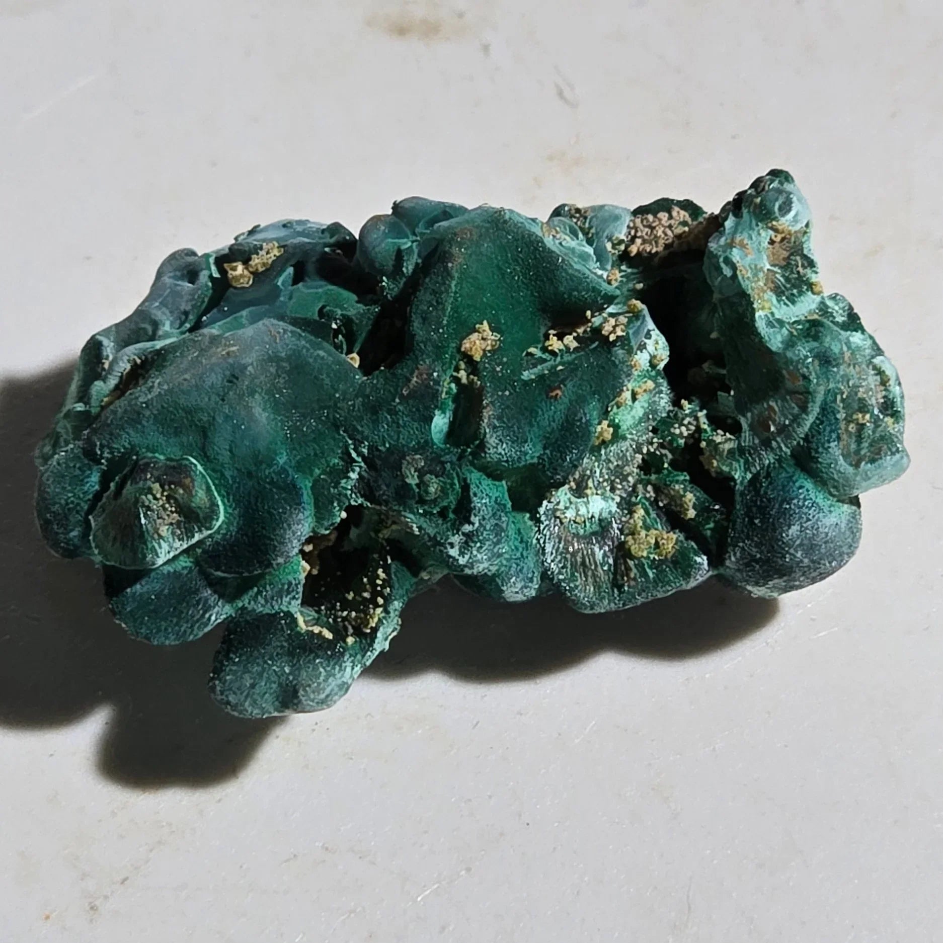Malachite mineral specimen with botryoidal texture and golden inclusions, ideal for collectors