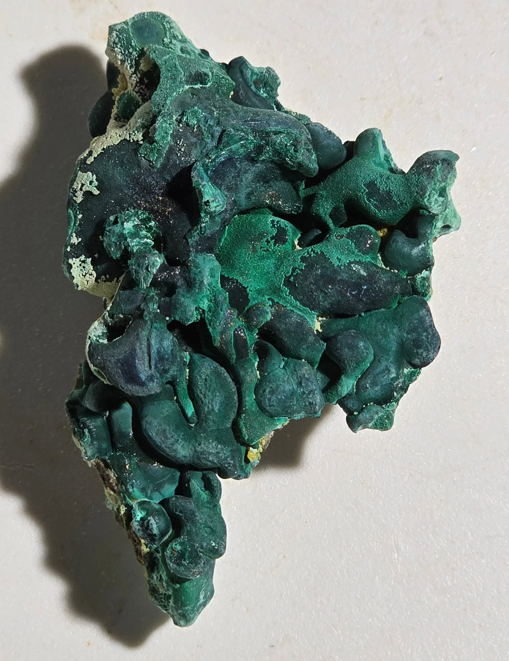 Malachite mineral specimen with vibrant green botryoidal formations, natural crystal texture