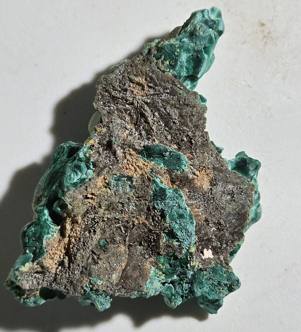 Malachite mineral specimen with vibrant green botryoidal formations on matrix, ideal for collectors