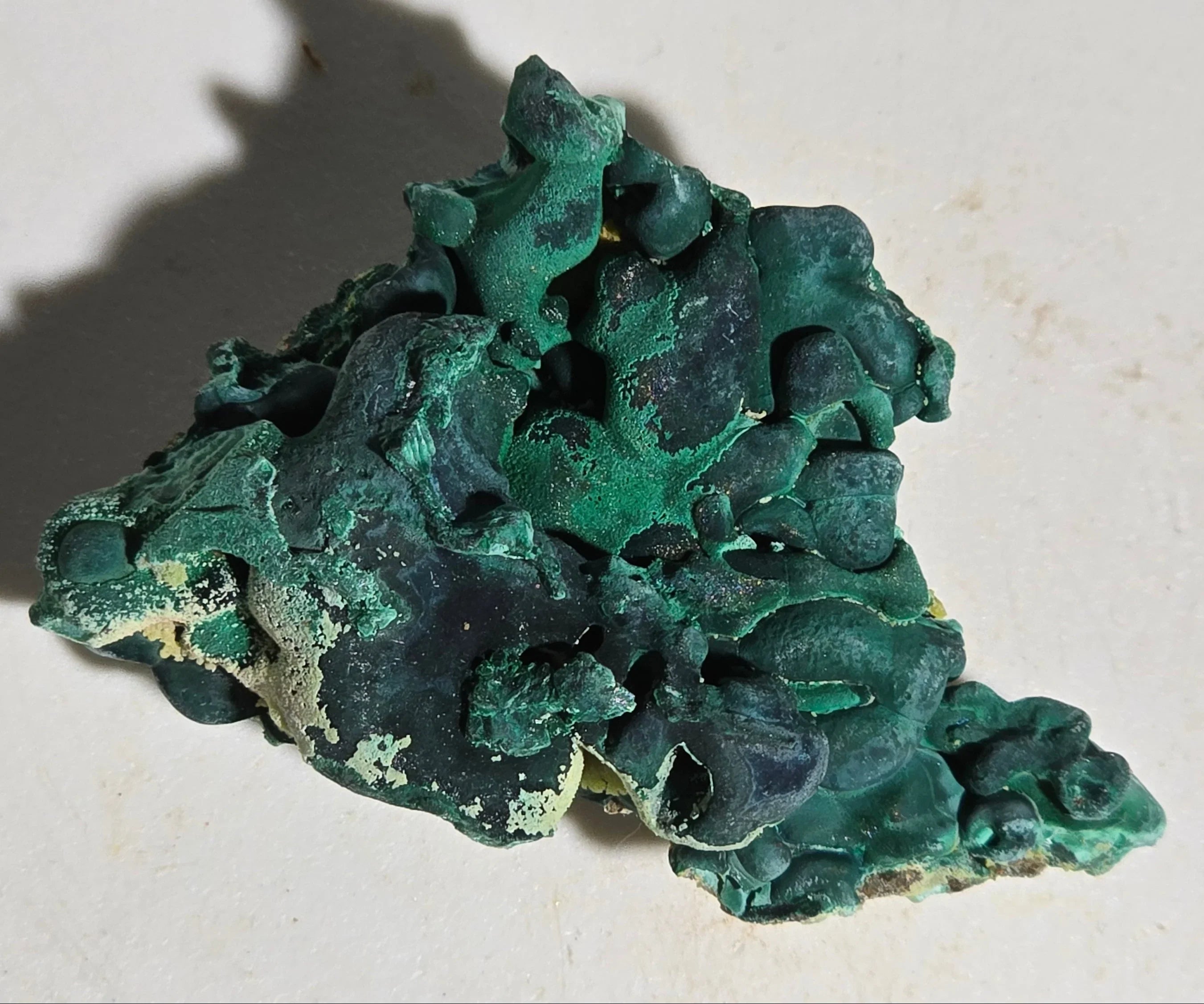 Malachite mineral specimen with vibrant green botryoidal formations, natural crystal collectible