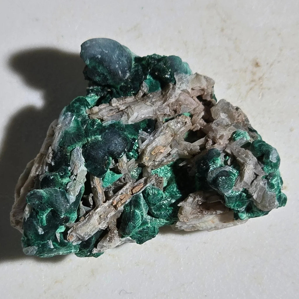 Malachite on matrix, vibrant green mineral specimen with earthy tones, ideal for collectors