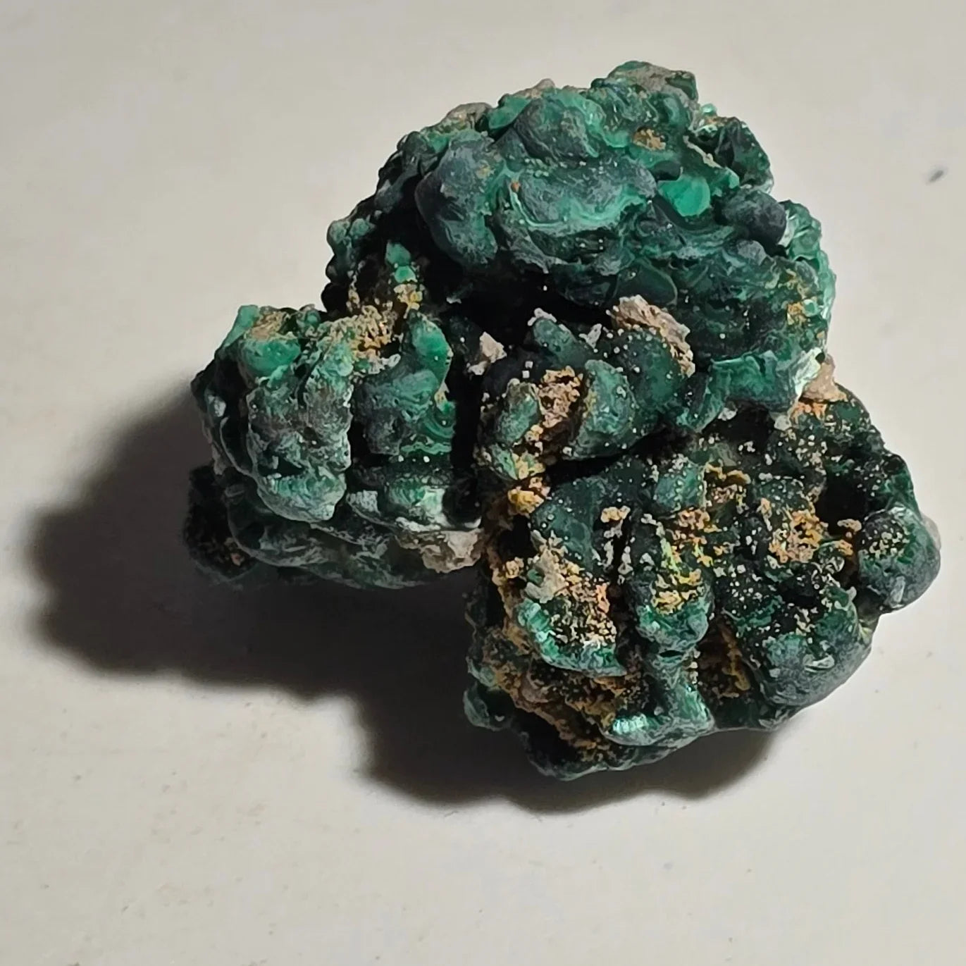 Malachite mineral specimen with vibrant green botryoidal formations, natural crystal cluster for collectors