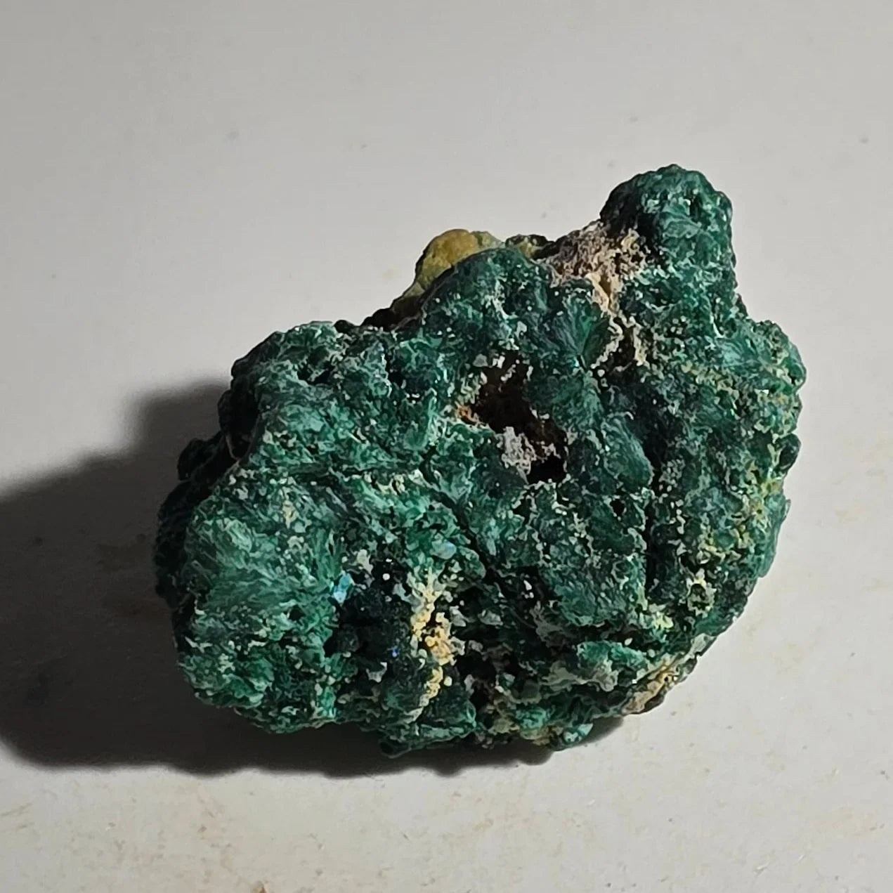 Malachite mineral specimen with vibrant green botryoidal texture, natural rough crystal formation
