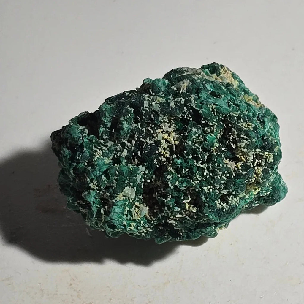Malachite mineral specimen with vibrant green botryoidal texture, natural crystal formation for collectors
