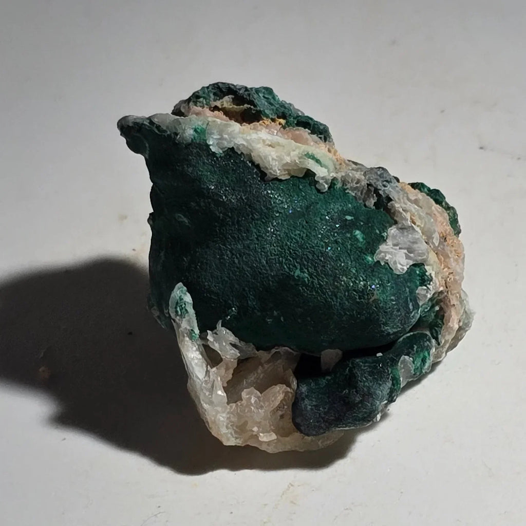Malachite on Quartz specimen, vibrant green mineral with crystal matrix, collector-grade geological specimen