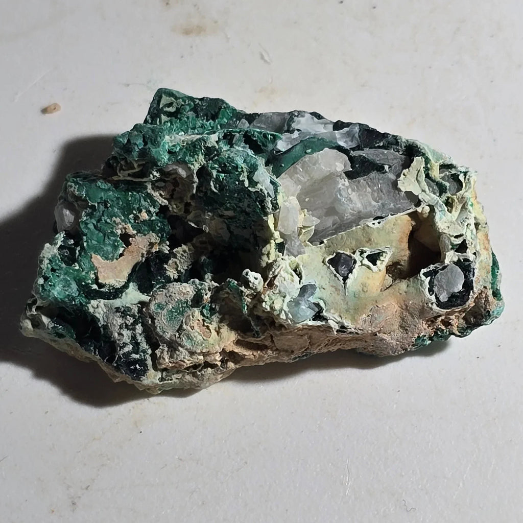 Malachite with quartz crystals, vibrant green mineral specimen from classic locality
