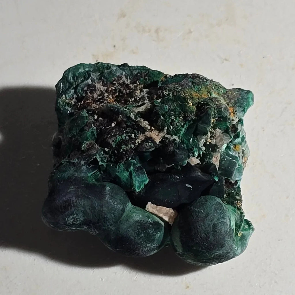 Malachite mineral specimen with botryoidal formations, vibrant green crystal clusters on matrix
