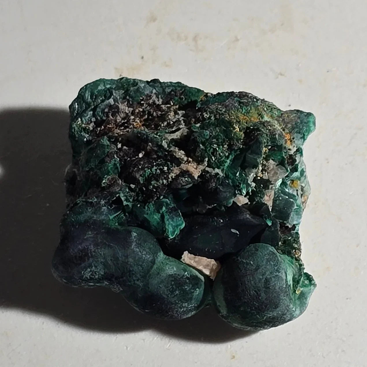 Malachite mineral specimen with botryoidal formations, vibrant green crystal clusters on matrix