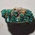 Malachite with quartz and chalcopyrite, vibrant green botryoidal formations on matrix