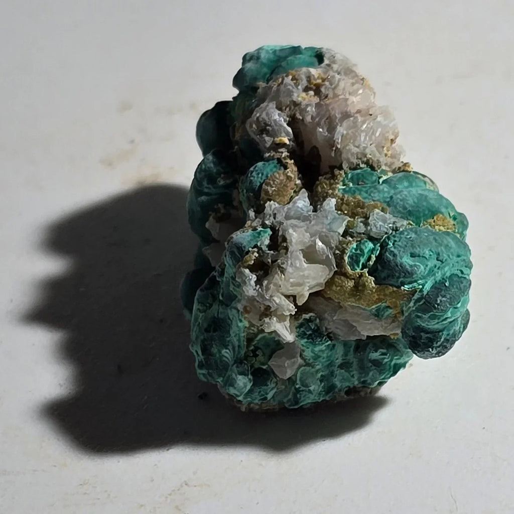 Malachite with quartz and chalcopyrite specimen, vibrant green botryoidal clusters on white matrix