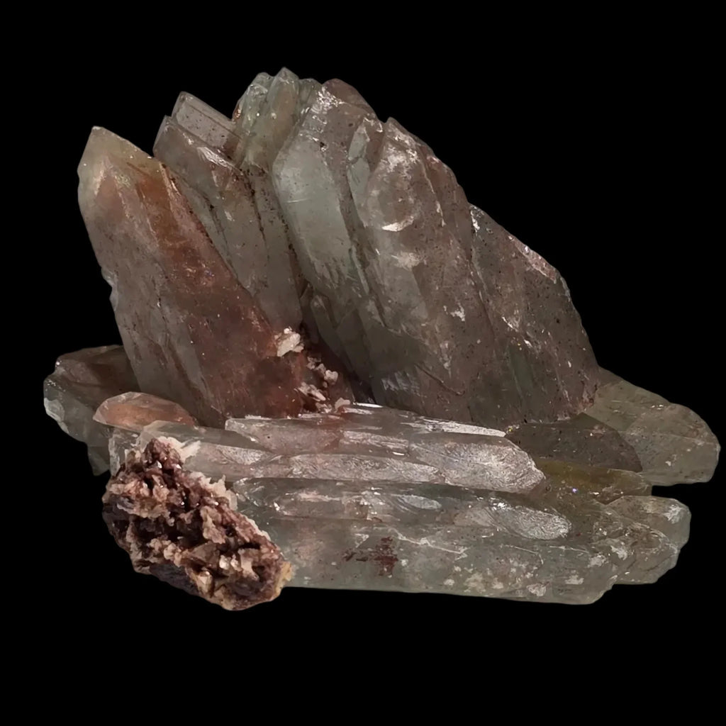 Fluorite crystal cluster with earthy matrix, showcasing natural mineral formation and geological texture