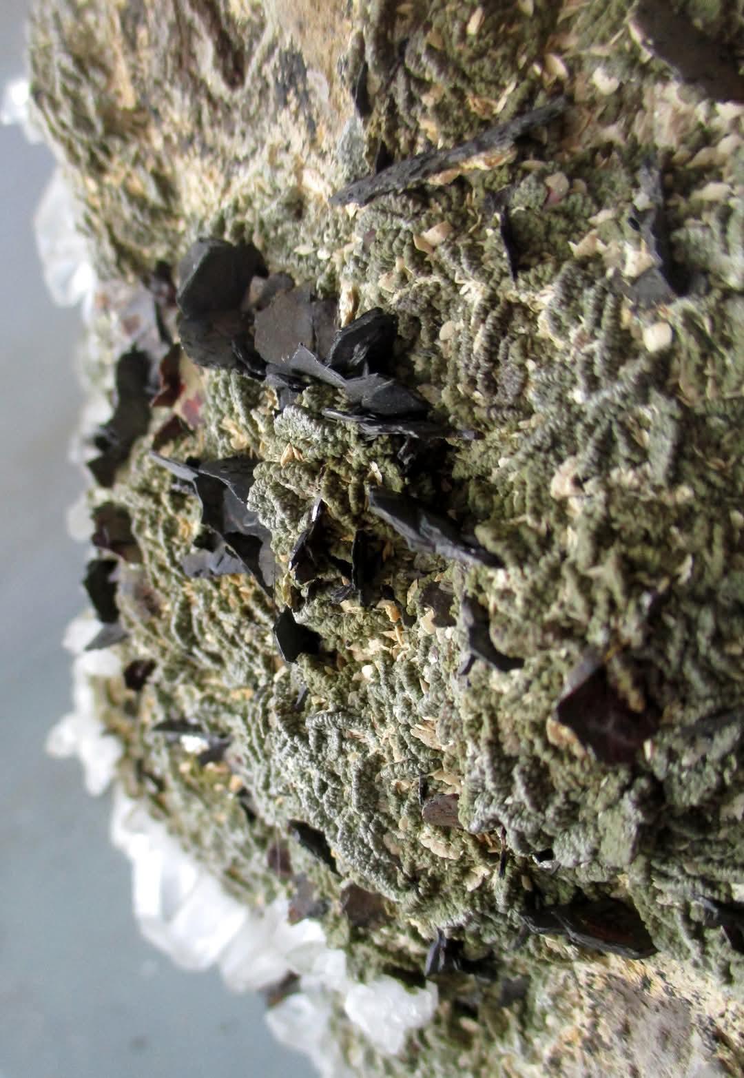 Hematite on green matrix with quartz, classic mineral specimen for collectors